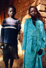 Two amputee children, victims of the 2000 bombing of the Comboni Primary School, a Catholic missionary school in the Nuba Mountains in Dafur, Sudan. Photo Credit: James Nicholls/Zuma Press